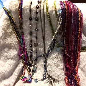 5 extra long necklaces and 1 metal tassle